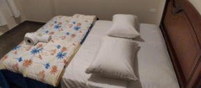 Depto A completo con 2 baños, cable, wifi, y garage gratuito